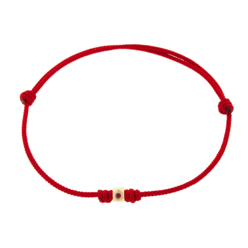 Flat Tetra with Ruby on a Red Cord Bracelet