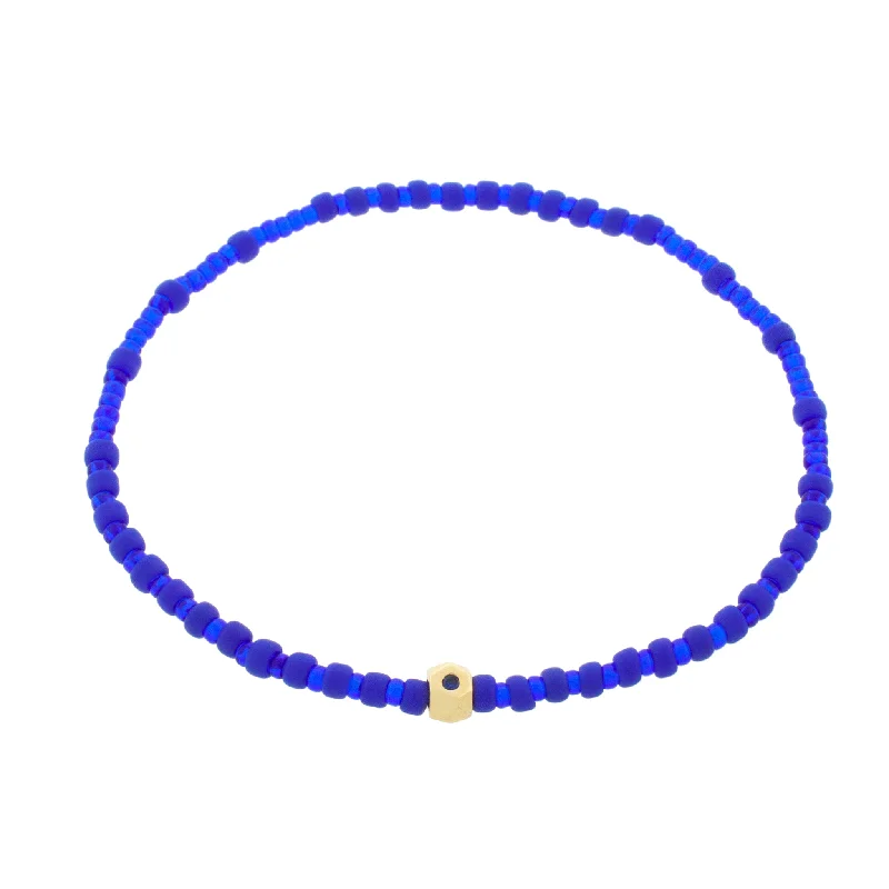 Flat Tetra with Blue Sapphire on a Blue Beaded Bracelet